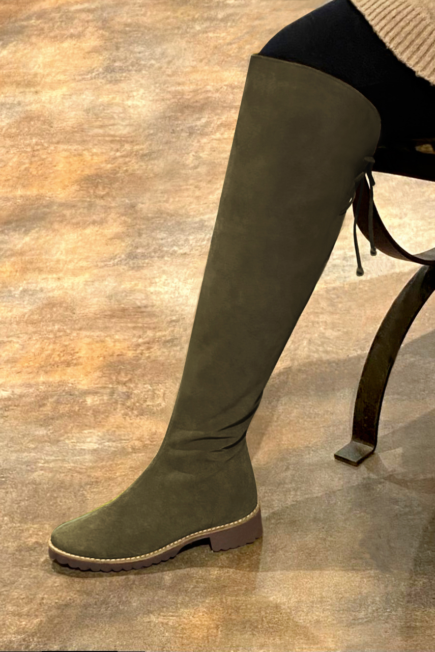 Khaki green women's leather thigh-high boots. Round toe. Flat rubber soles. Made to measure. Worn view - Florence KOOIJMAN
